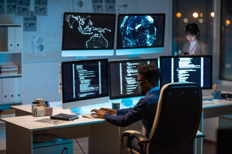 young-contemporary-cyber-security-manager-typing-web young-contemporary-cyber-security-manager-typing-web
